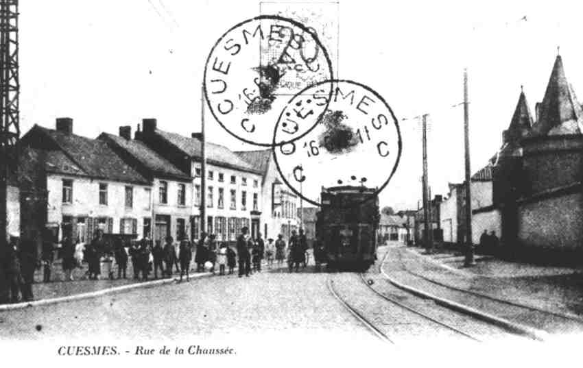 Cuesmes : rue E. Vandervelde anciennement rue de la Chaussée. Le 3 mars 1912 s'y  arrêtait le premier tram à vapeur.